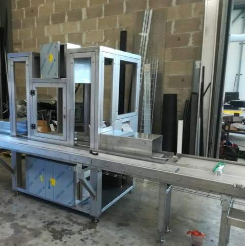 Machine à convoyeur